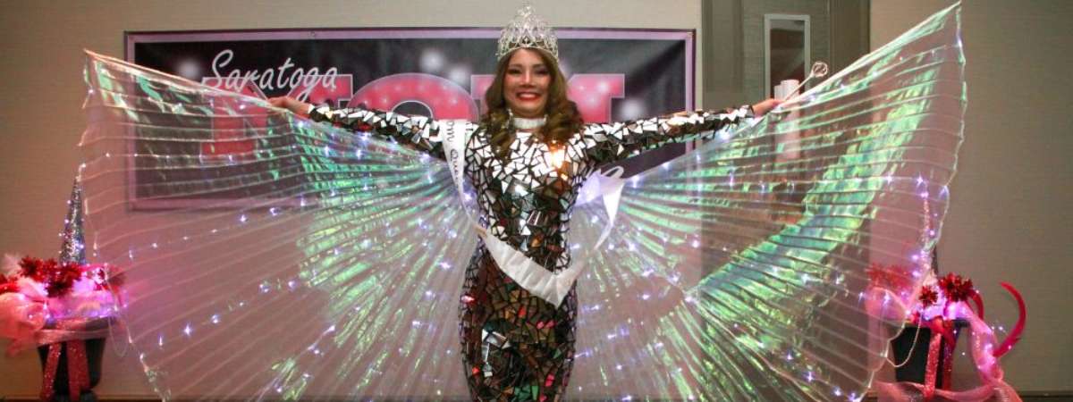 woman dressed in winged outfit at mom prom