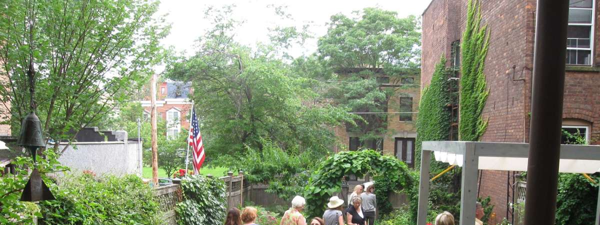 people on a tour through a garden