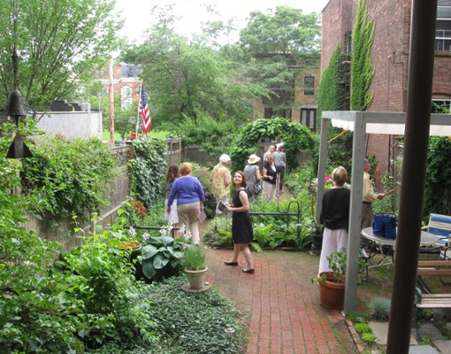 people on a tour through a garden