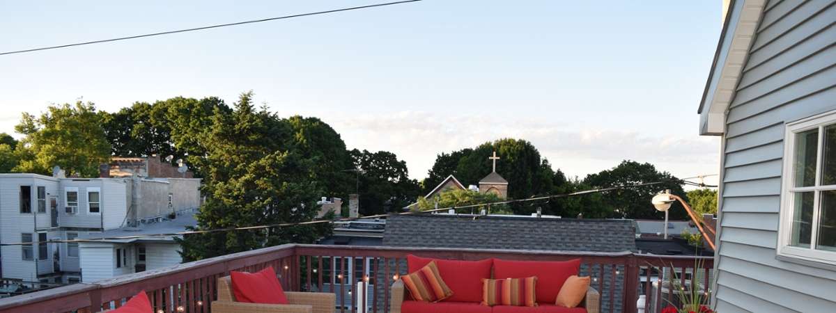 huge deck with red furniture