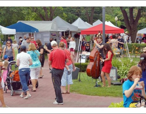 art in the park tents and people in congress park