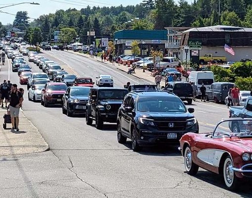 tons of cars driving down lake george street