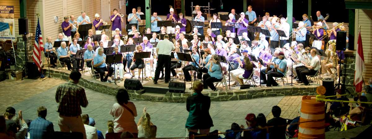 band playing in an amphitheatre at night