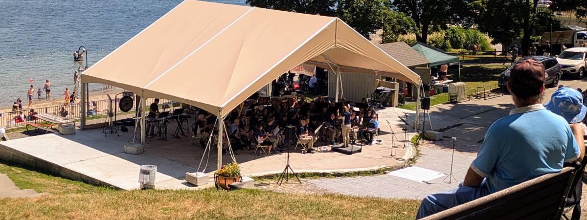 community band plays with beach in background