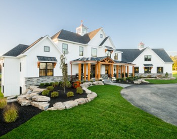 White home with wooden patio