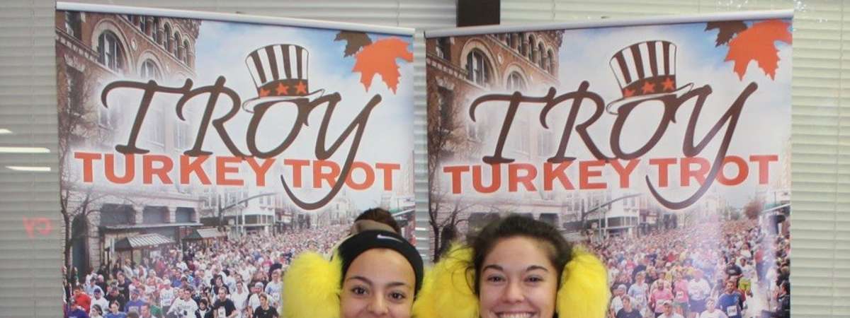 two women in festive turkey troy outfits