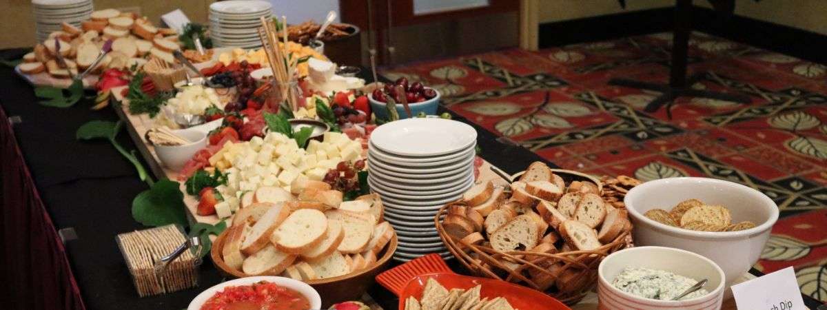 buffet with crackers, cheese, fruit