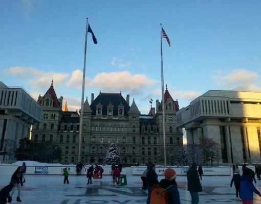 a different picture of people skating in front of the plaza