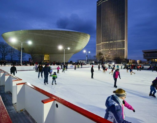 people skating with the egg in the background