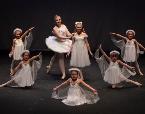 group of dancers posing