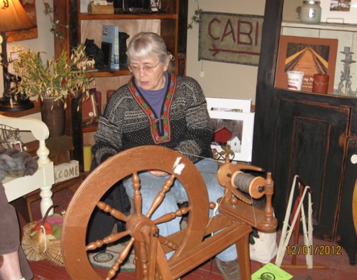 view of a weaving studio and a woman