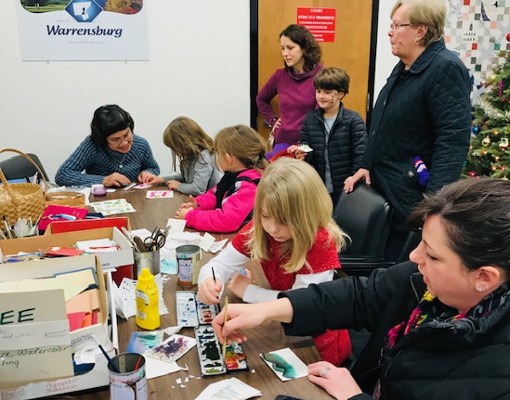 people working on crafts