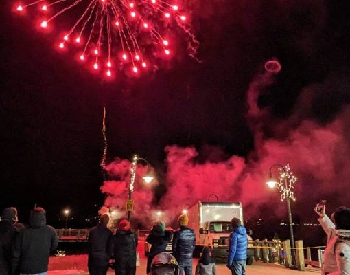 pink fireworks at lake george winter carnival