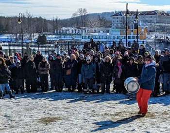 keg toss at lake george winter carnival