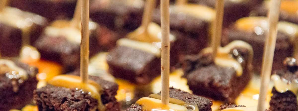 what looks like chocolate appetizers with toothpicks