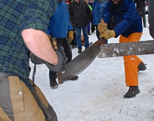 people sawing something
