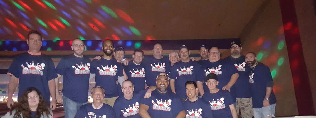 large group with the same bowling shirt