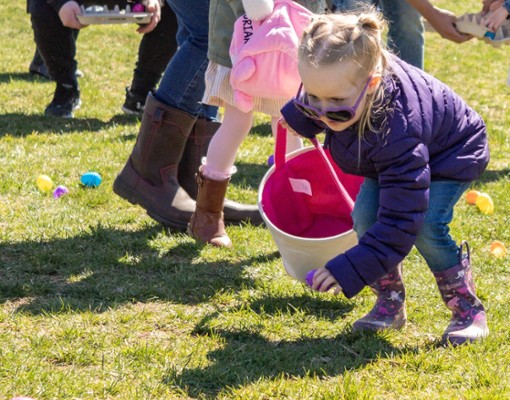 girl searching for Easter eggs