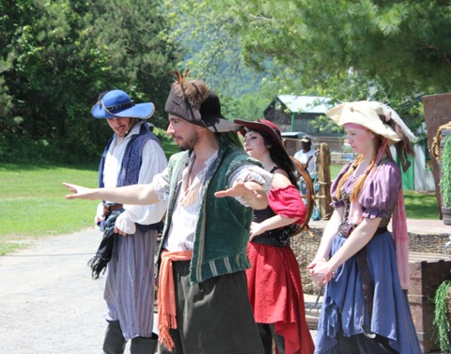 people dressed in renaissance costumes