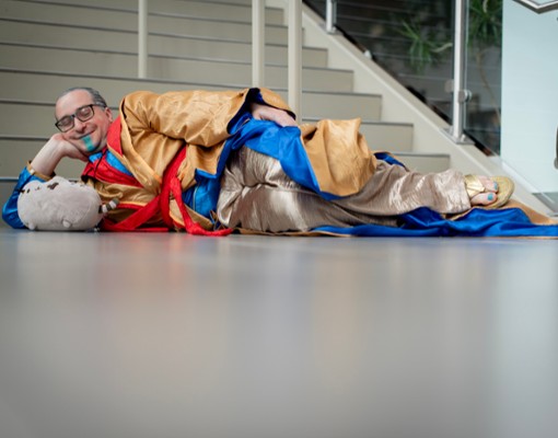 man dressed as the grandmaster marvel character