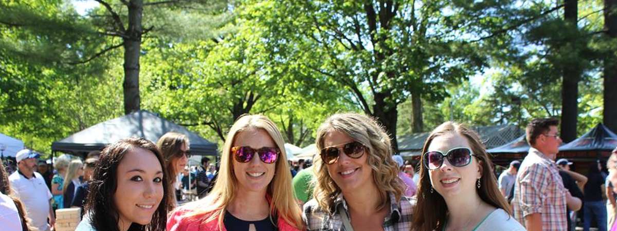 four women at beer festival