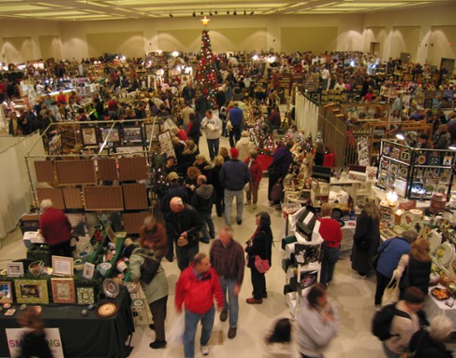 large crowd at a holiday marketplace