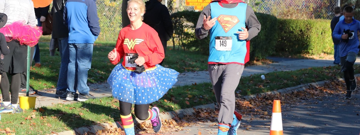 people running in a halloween race