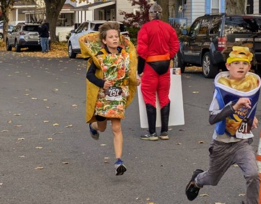 kids in taco and mac and cheese costumes running 5k