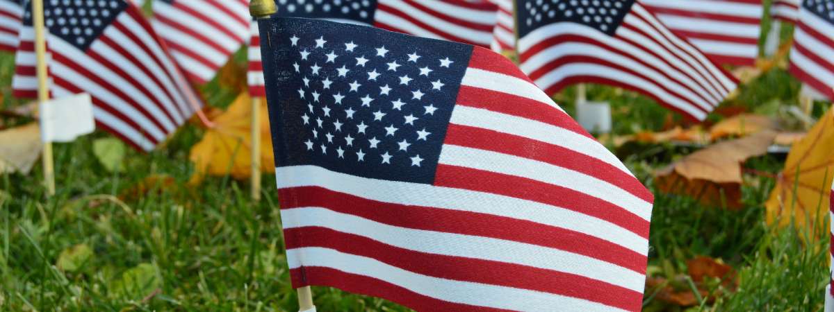 american flags in the ground