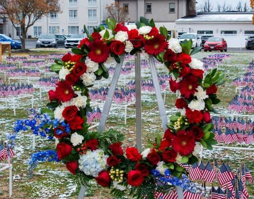 wreath at field of flags