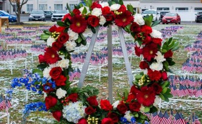 wreath at field of flags