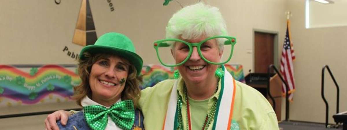 two people in st patrick's outfits