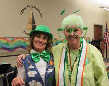 two people in st patrick's outfits