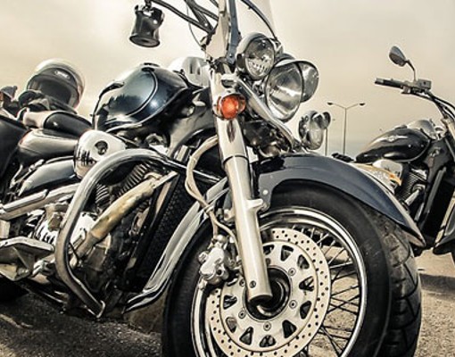 up close look at two black motorcycles