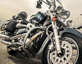 up close look at two black motorcycles