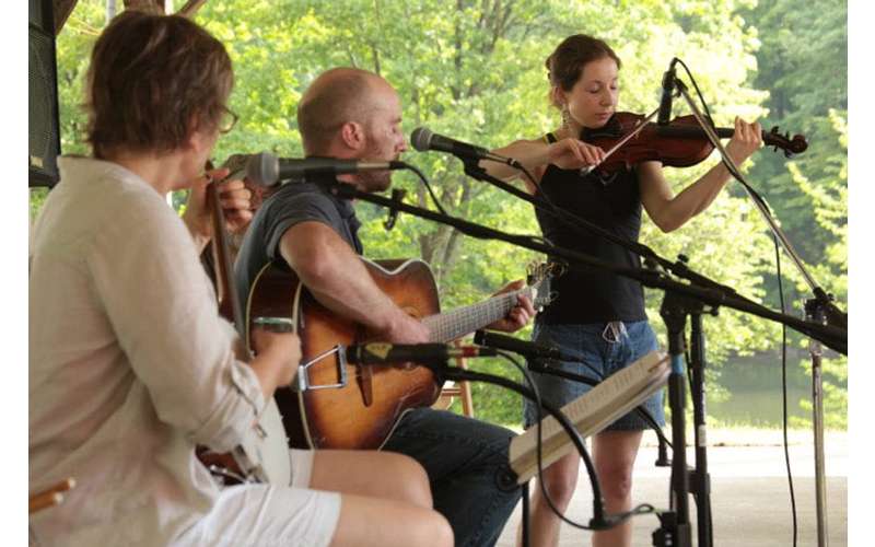 musicians playing on a stage