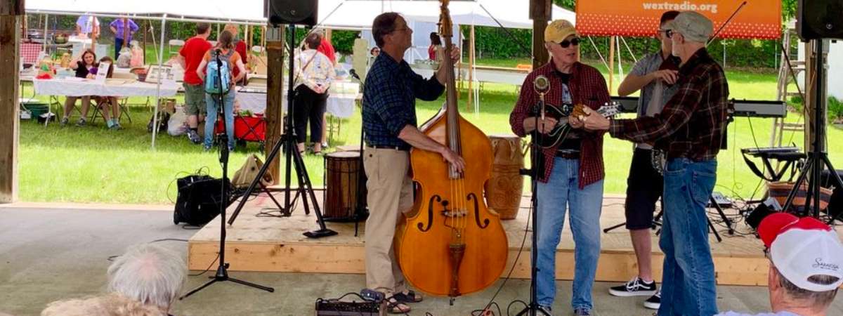 musicians playing on a stage