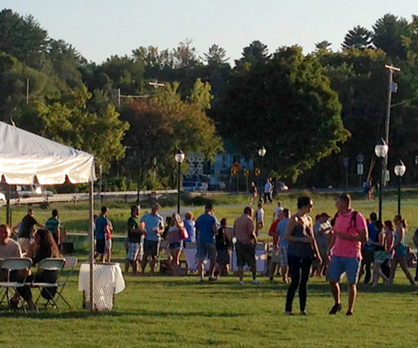 people attending an event in charles r. wood park