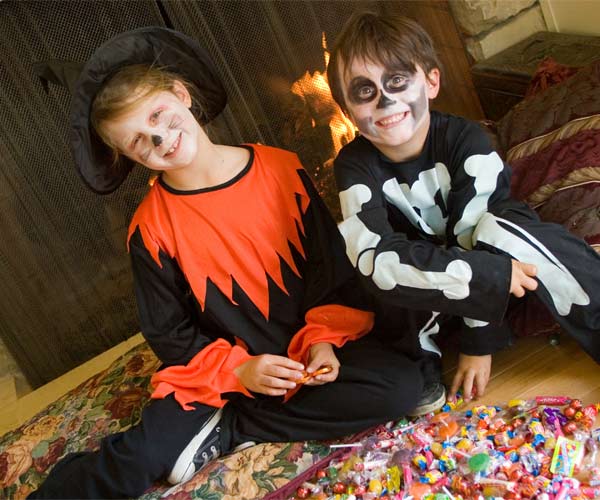 kids with halloween candy