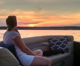 woman on boat in saratoga lake