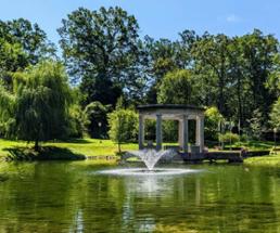 fountain in pond in park