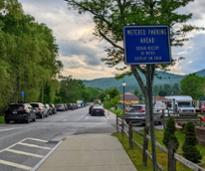 metered parking ahead sign in lake george village