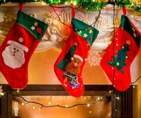 three red decorated christmas stockings