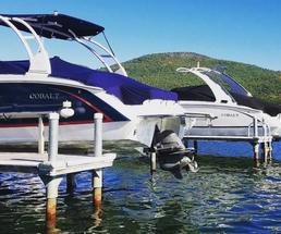 two cobalt boats docked