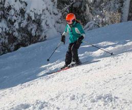 young girl skiing
