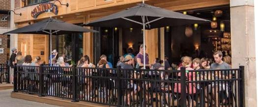 people seated in outdoor patio space at the Cantina restaurant