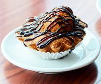 pastry with chocolate drizzled on top
