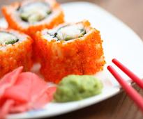 sushi with red chopsticks