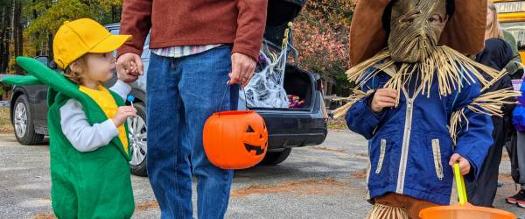 kids in costume at trunk or treat event