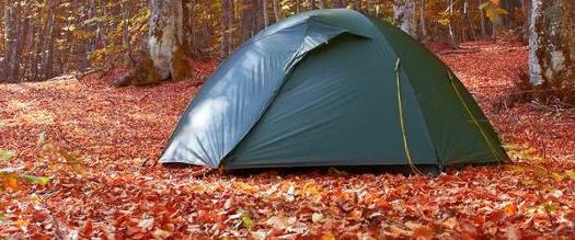 tent in woods in the fall